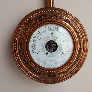 Face of French vintage Barometer showing dial in French