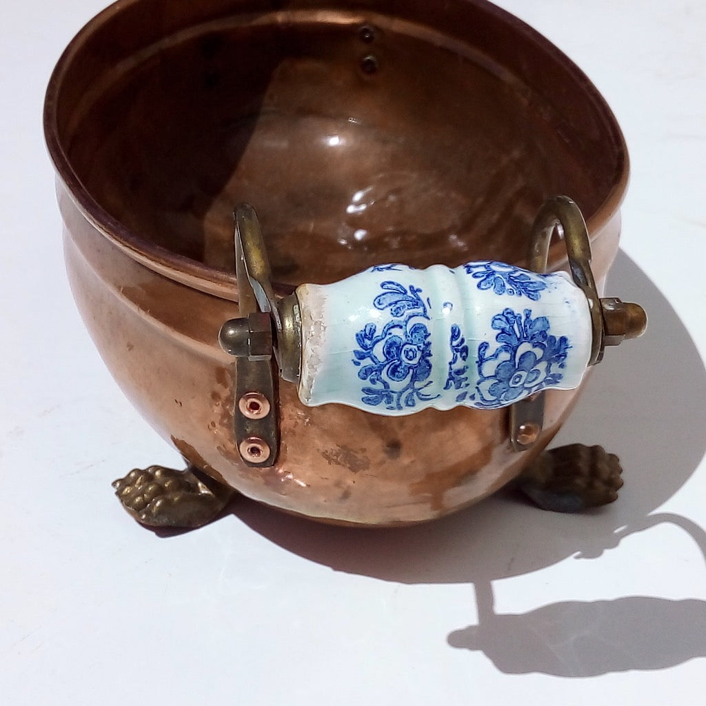 Blue and white porcelain handle of French copper pot at French Originals NZ