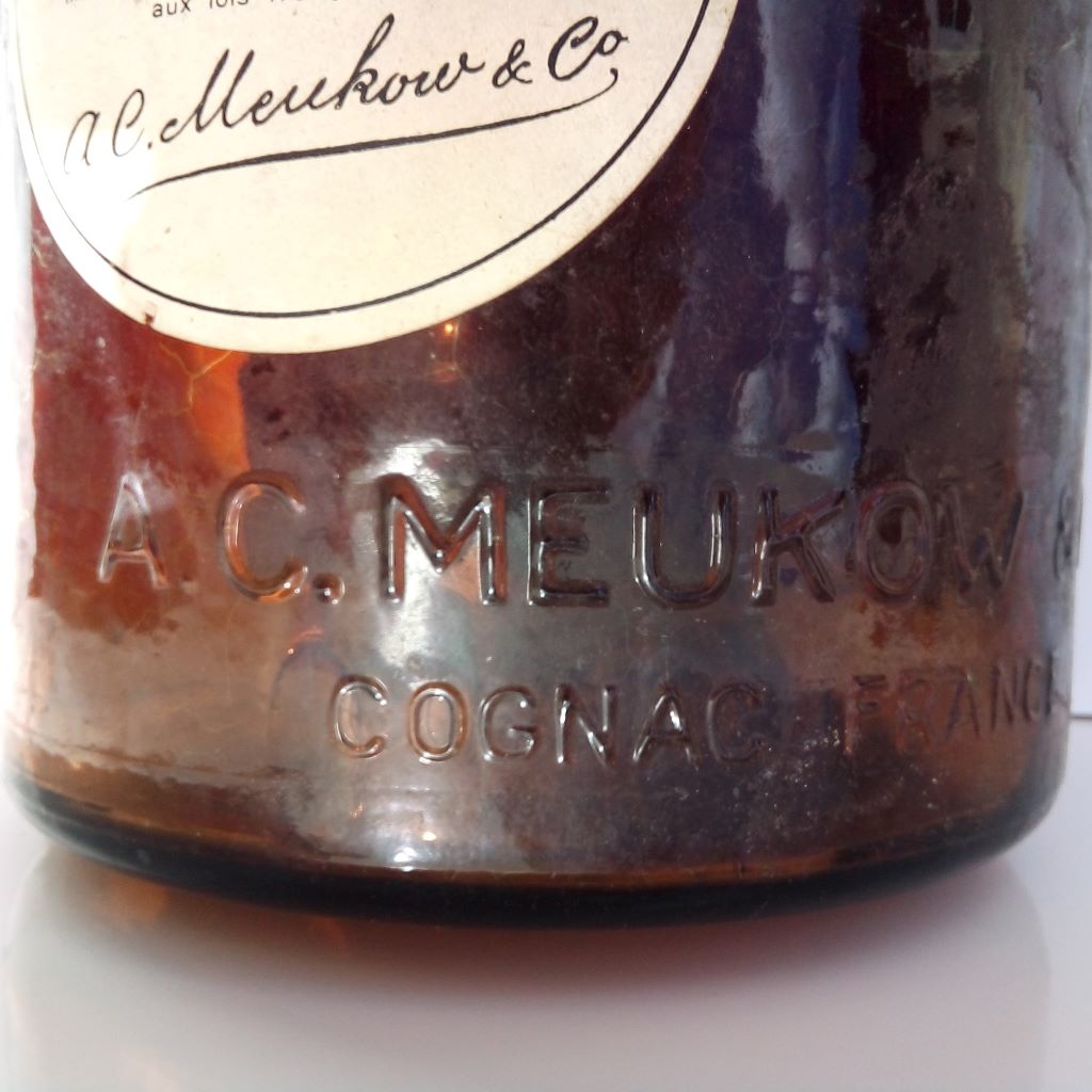 A C Meukow cast into French vintage bottle at French Originals NZ