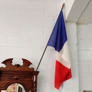 Antique French Flag flag leaning on wall at French Originals NZ