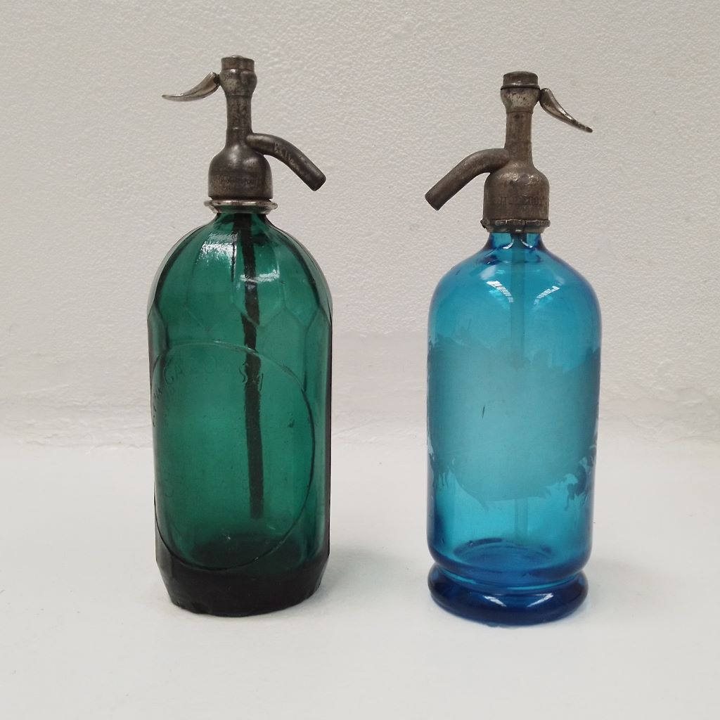 blue and green antique French soda bottles at French Originals NZ