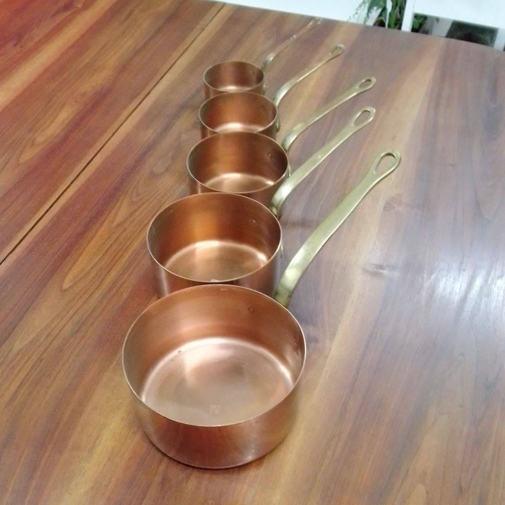 five French copper pots with brass handles at French Originals NZ