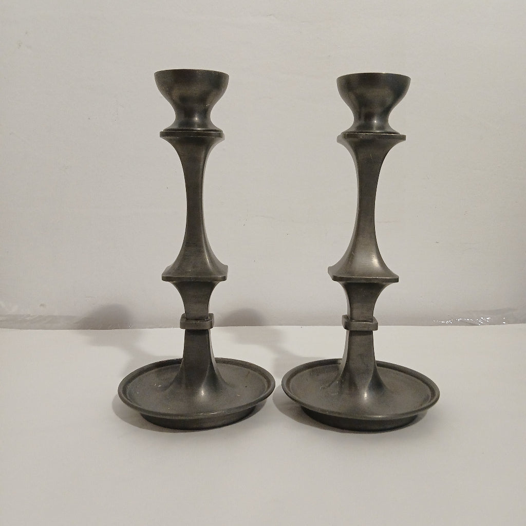 Pair of pewter candle holders on a white background at French originals antiques