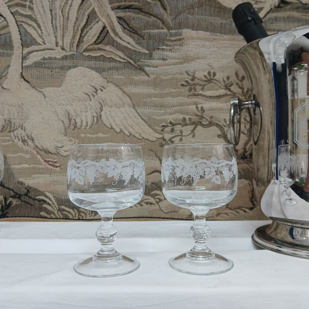 Two etched goblets and a champagne bucket at French originals antiques