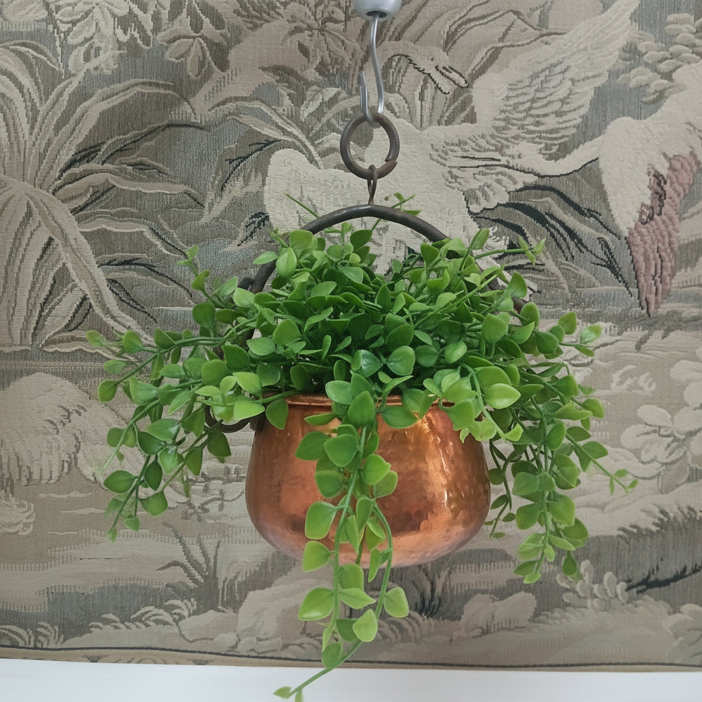 old copper fire pot hanging with a plant in it at French Originals antiques