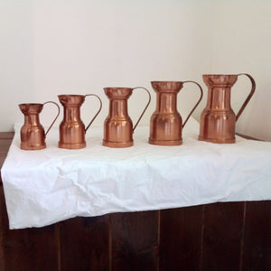 French Vintage set of 5 copper jugs at French Originals NZ