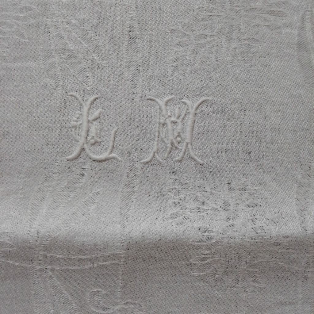 L M initials embroidered on French vintage linen napkins at French Originals NZ