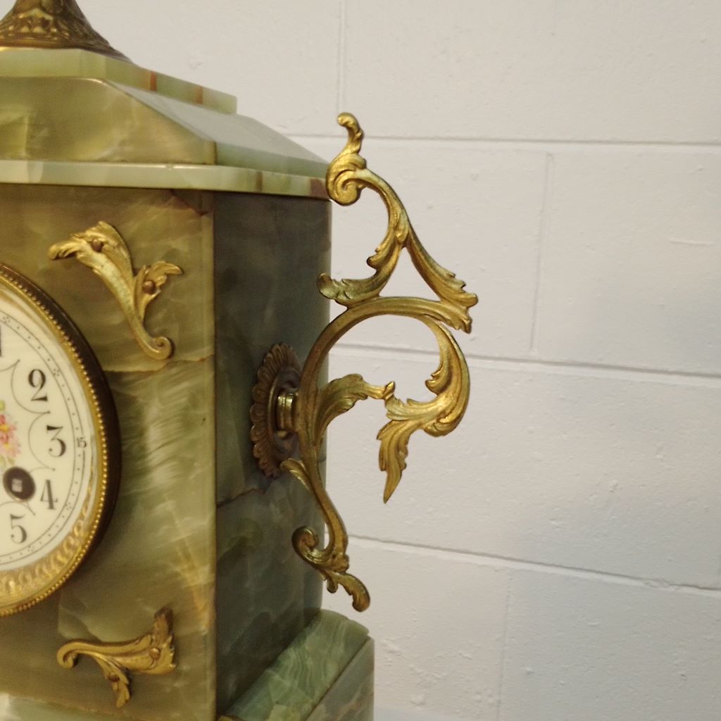 Ormolu detail on side of French Antique mantle clock from French Originals NZ