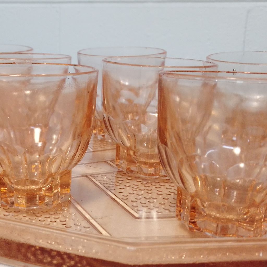 close up shot of delicate pink glasses on glass tray from French Originals NZ