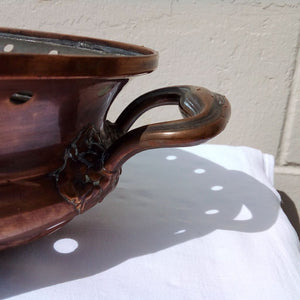 curved handle on French copper dish at French Originals NZ