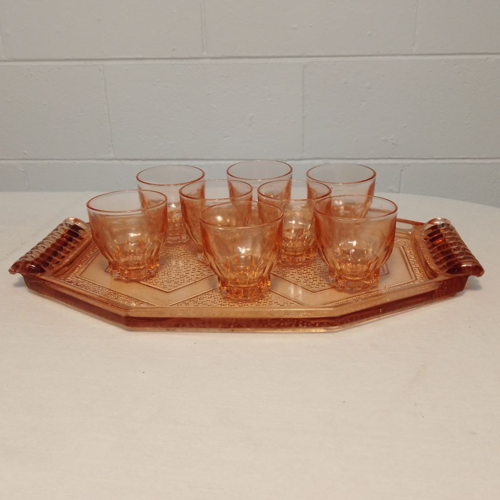 eight French pink Rosaline glasses sitting on matching tray from French Originals NZ