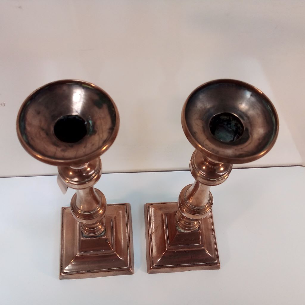 looking down on French antique brass candlesticks at French Originals NZ