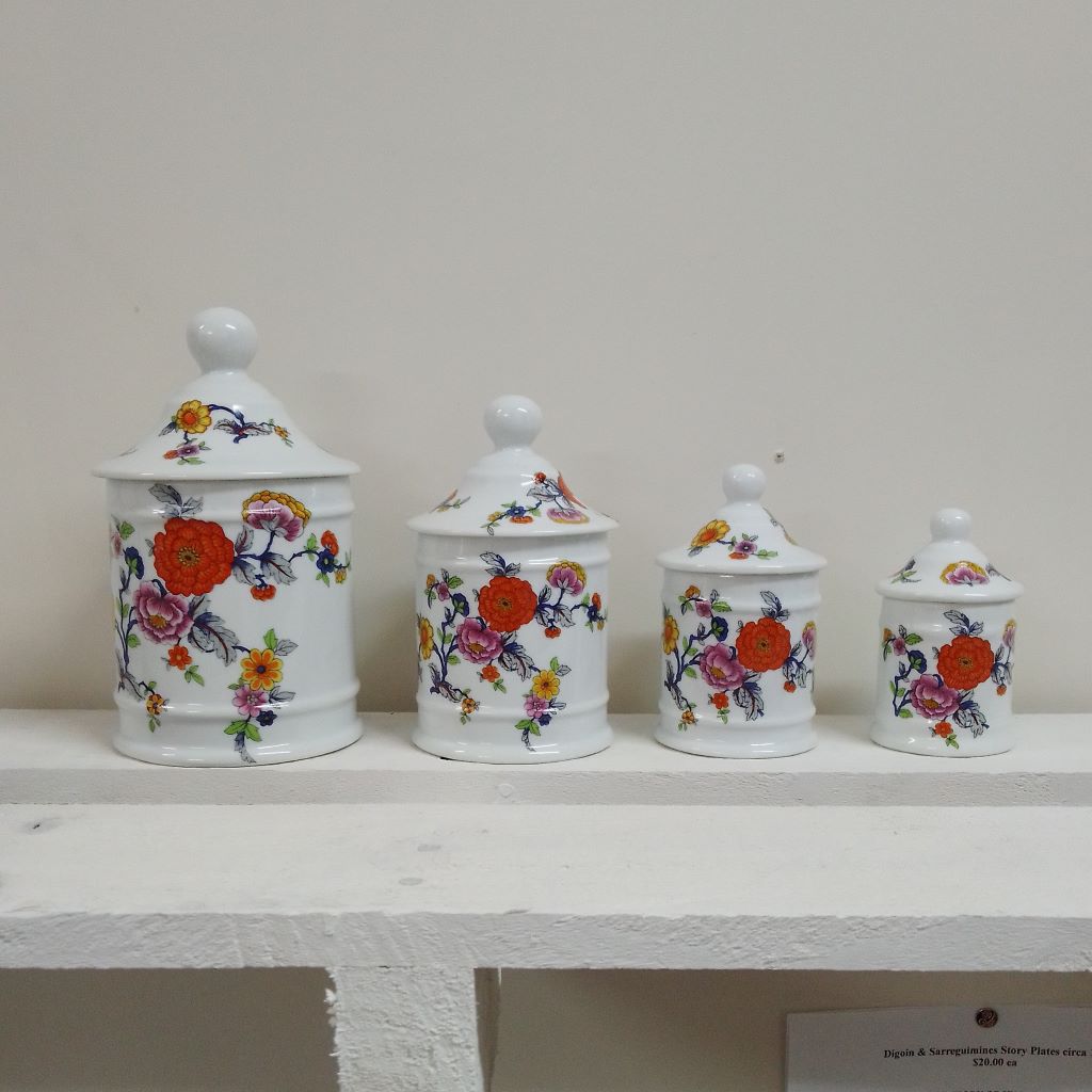four brightly decorated Limoges porcelain kitchen cannisters at French Originals NZ
