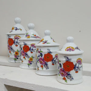 set of four limoges porcelain jars with bright flower decoration at French Originals NZ