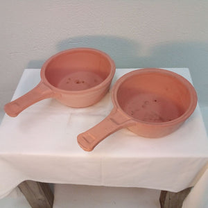 two sides of terracotta French cooking pot at French Originals NZ