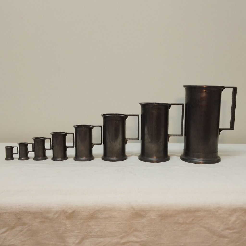 8 antique french pewter measuring cups from French Originals NZ