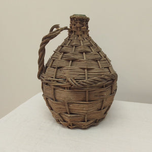 Antique French Bottle in basket NZ