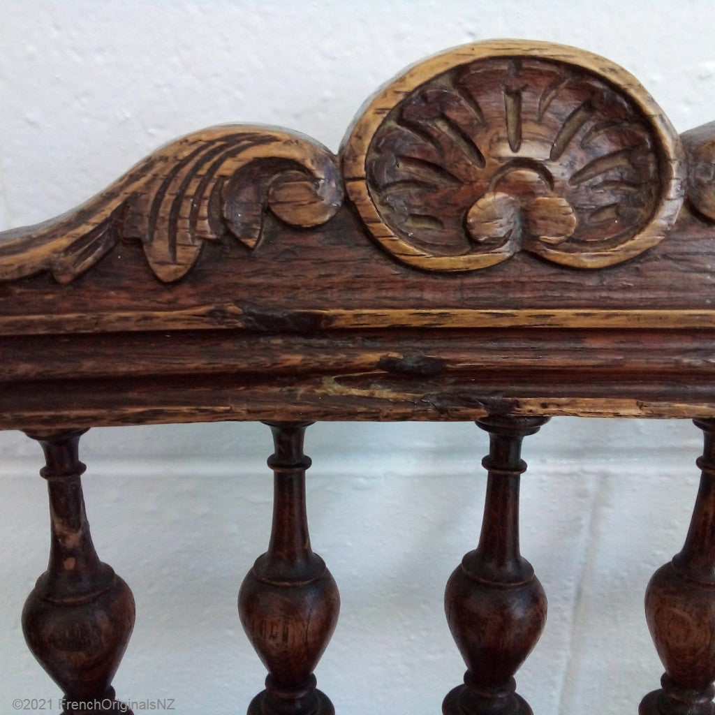 Carving detail on back of antique french chair nz