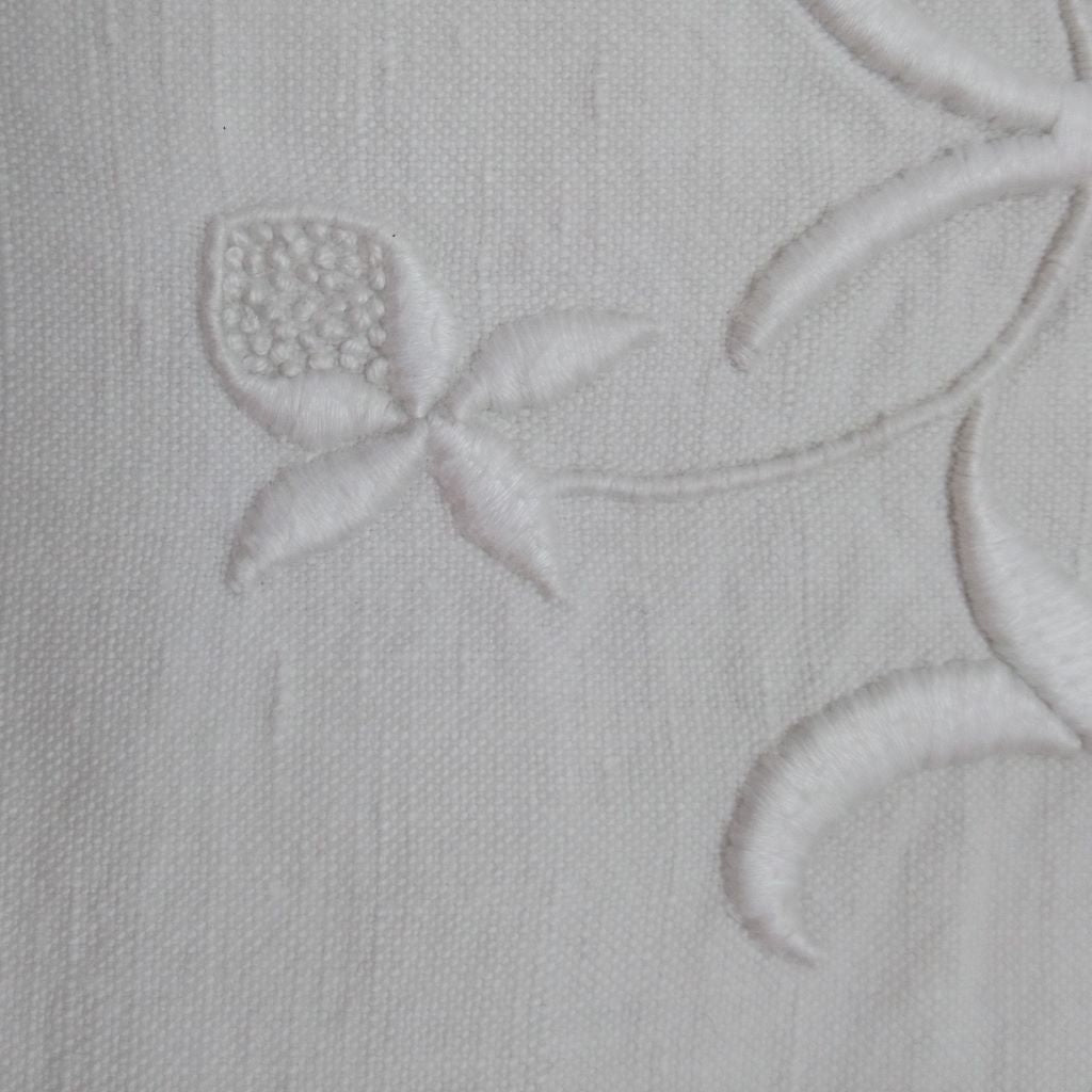 Embroidered flower detail on French vintage bedsheet from French Originals NZ