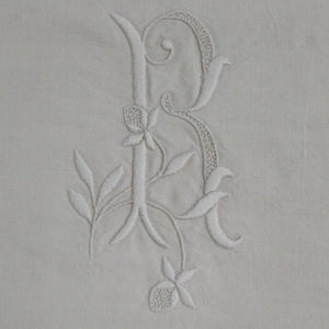 Initial R embroidered on a french vintage sheet from French Originals NZ