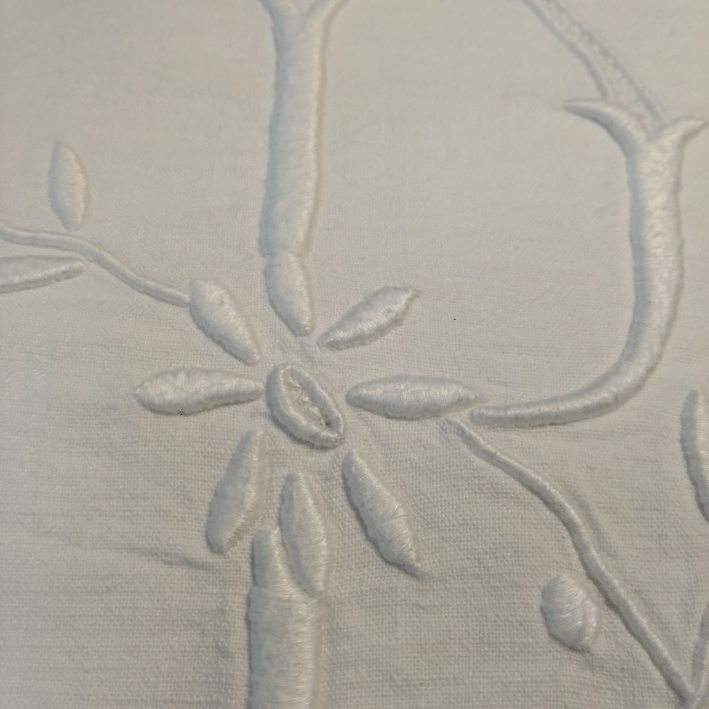 close up of embroidery on French vintage bedsheet from French Originals NZ